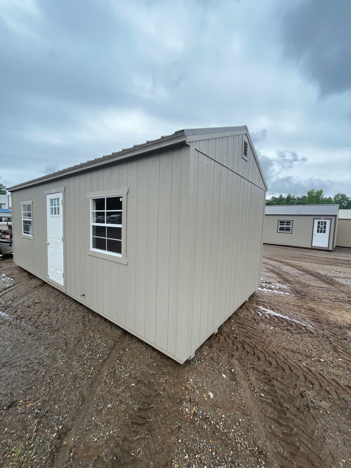 Portable garage with roll-up door